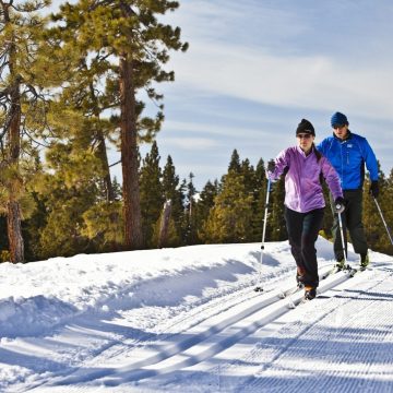 Couple skiing nice groomed cross country runs at Lake Tahoe