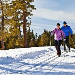 Couple skiing nice groomed cross country runs at Lake Tahoe